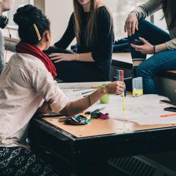 Stockphoto of students discussing projects